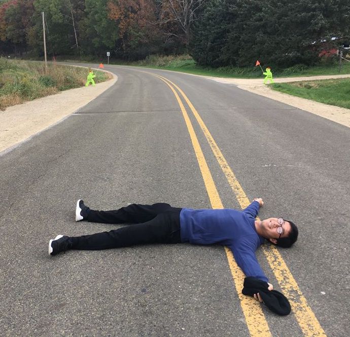Me lying on the road for no reason <br> (10 points if you know where this is)